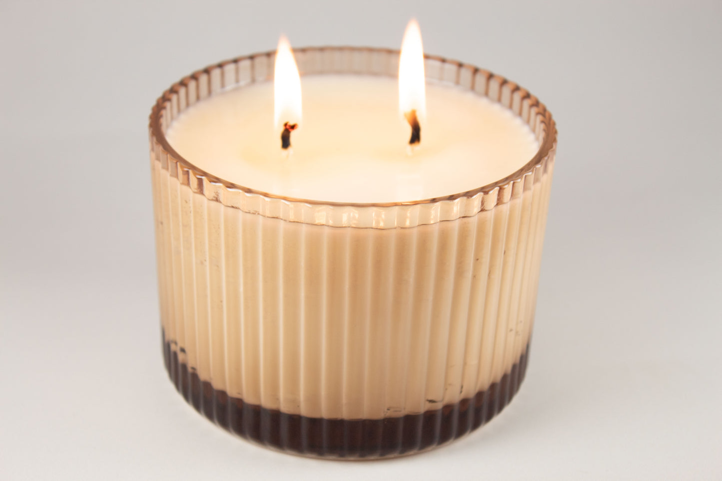 Top view of Unplug Soy Candle in fluted glass jar