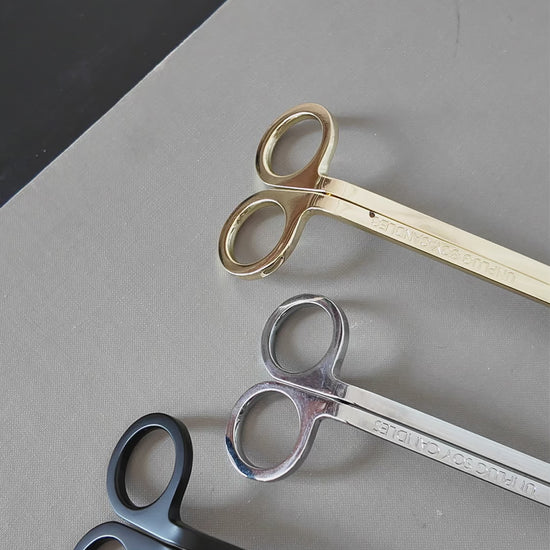 Unplug wick trimmer video showing how to trim a candle wick for a cleaner burn