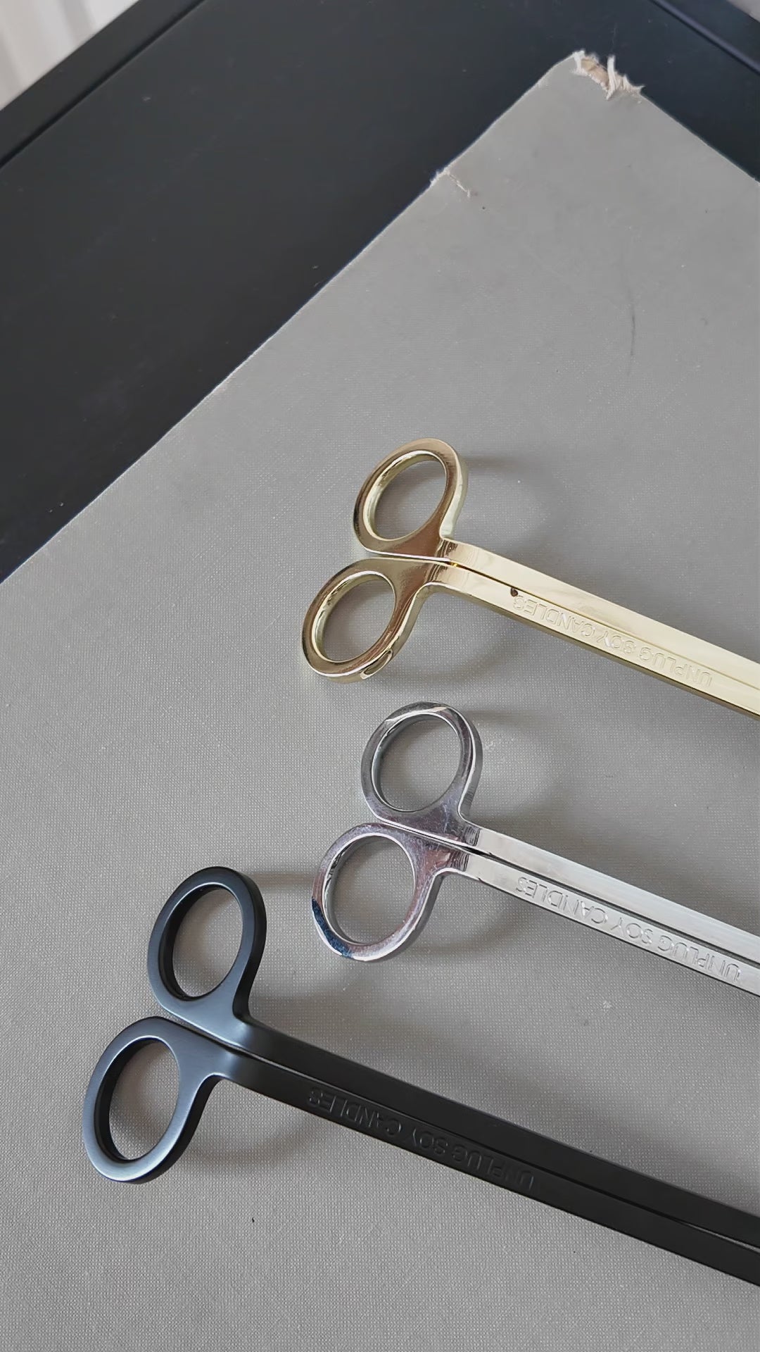 Unplug wick trimmer video showing how to trim a candle wick for a cleaner burn