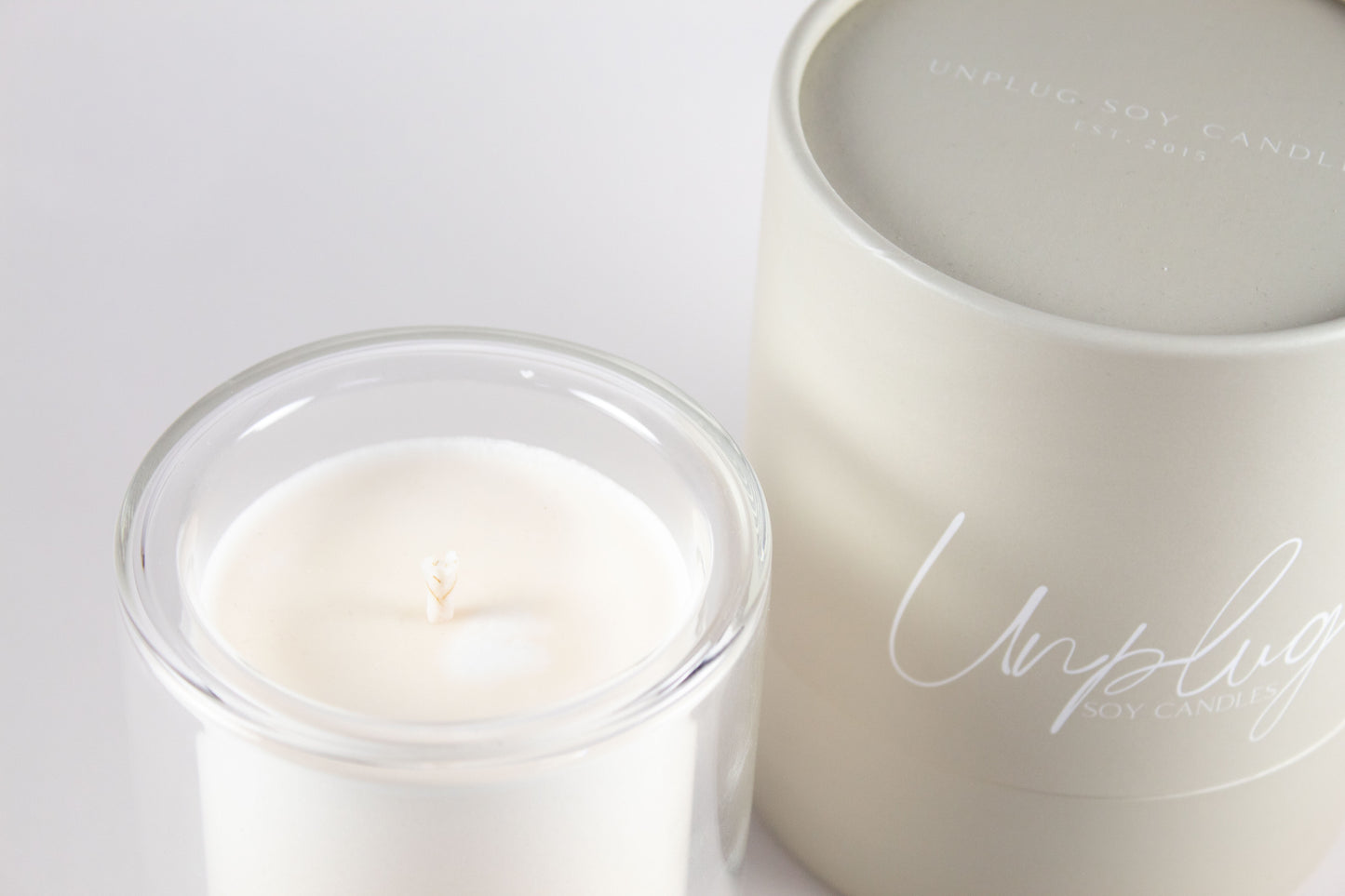 Angled view of Unplug Petite Mysa Candle