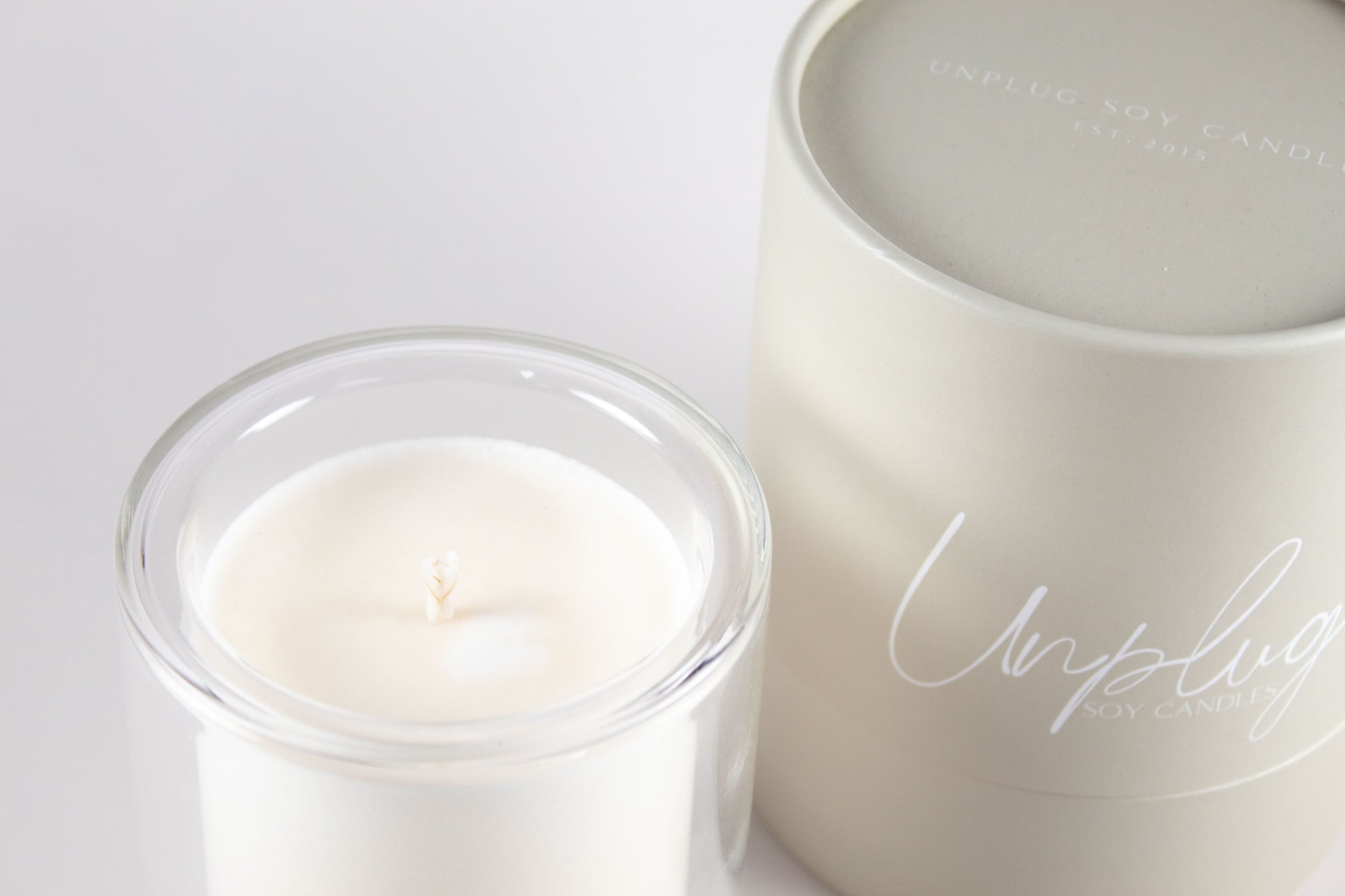 Angled view of Unplug Petite Mysa Candle