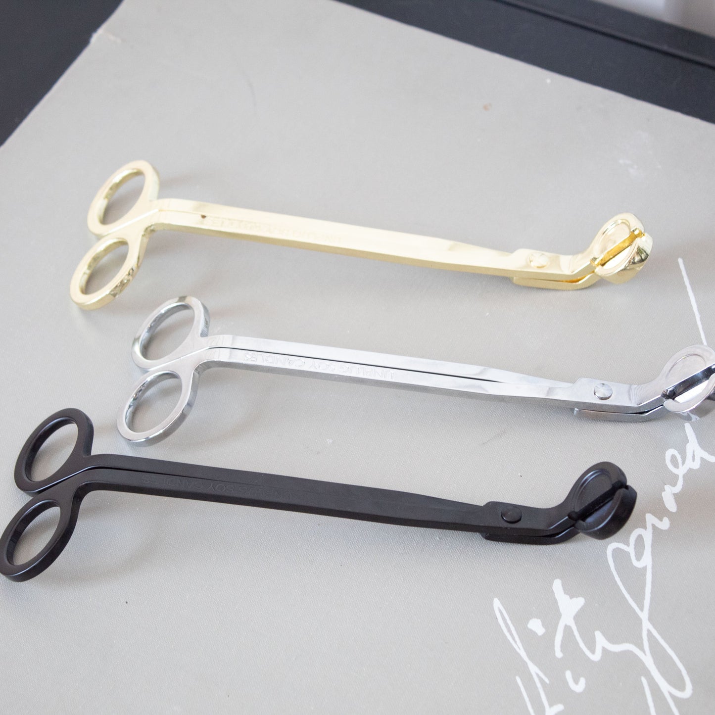 Unplug wick trimmer candle care tool for trimming candle wicks cleanly
